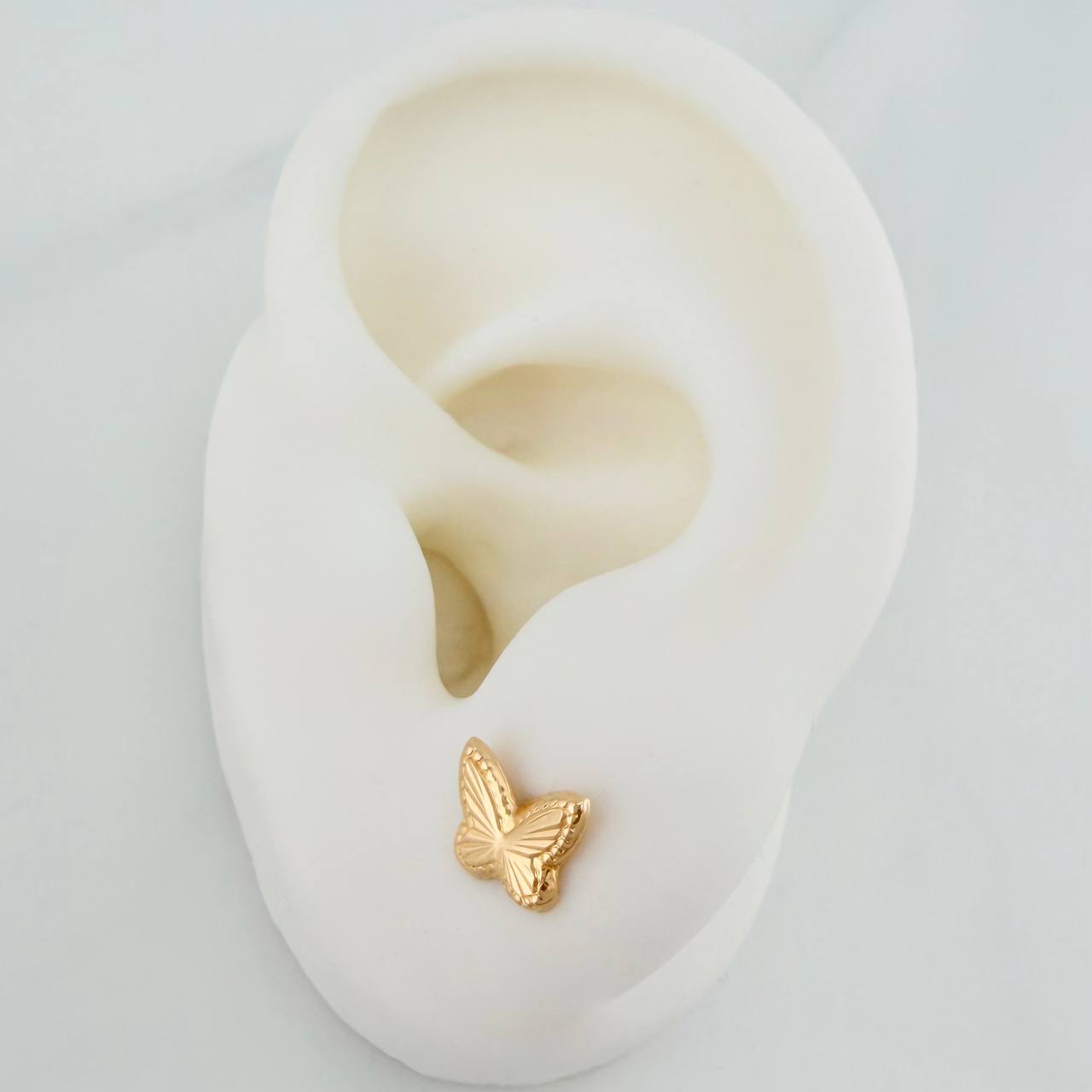 Topos Mariposa 1.05gr / 9.9mm Oro Amarillo 18K %