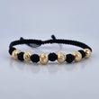 Pulsera Tejida Negra Bolas 1.85gr / Oro Amarillo 18K &