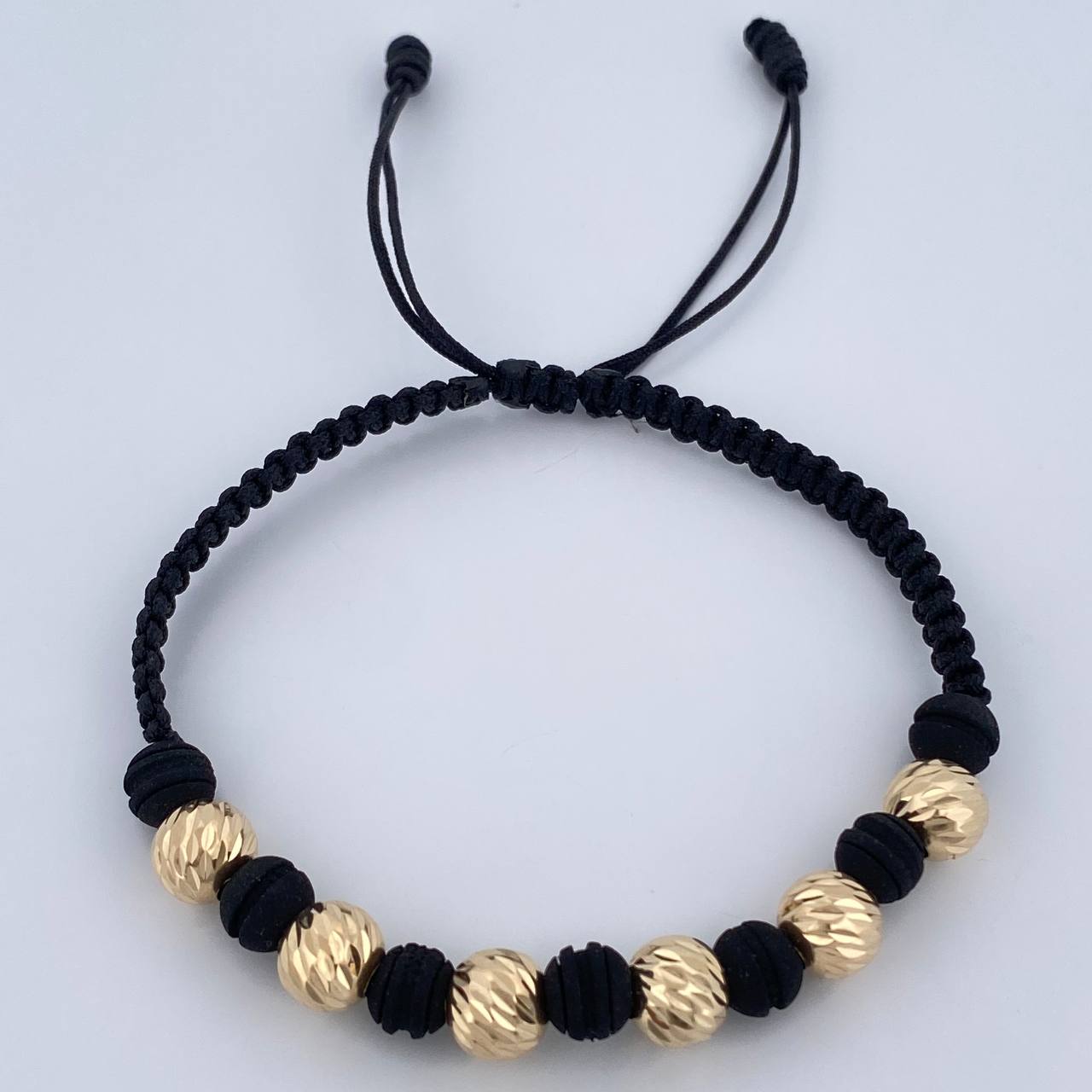 Pulsera Tejida Negra Bolas 1.85gr / Oro Amarillo 18K &