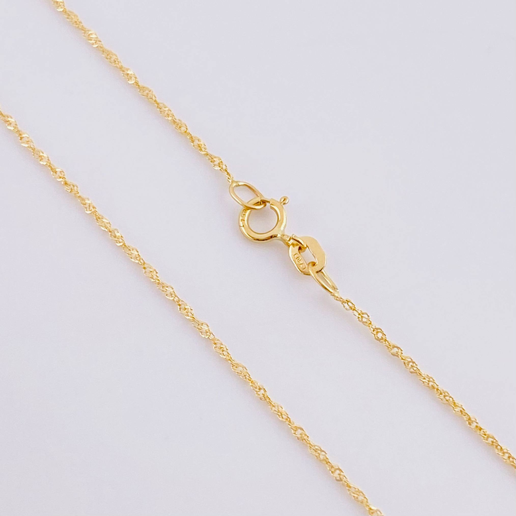 Set Cadena Singapur + Dije Silueta Corazón / 2g / 60cm Oro Amarillo 18K