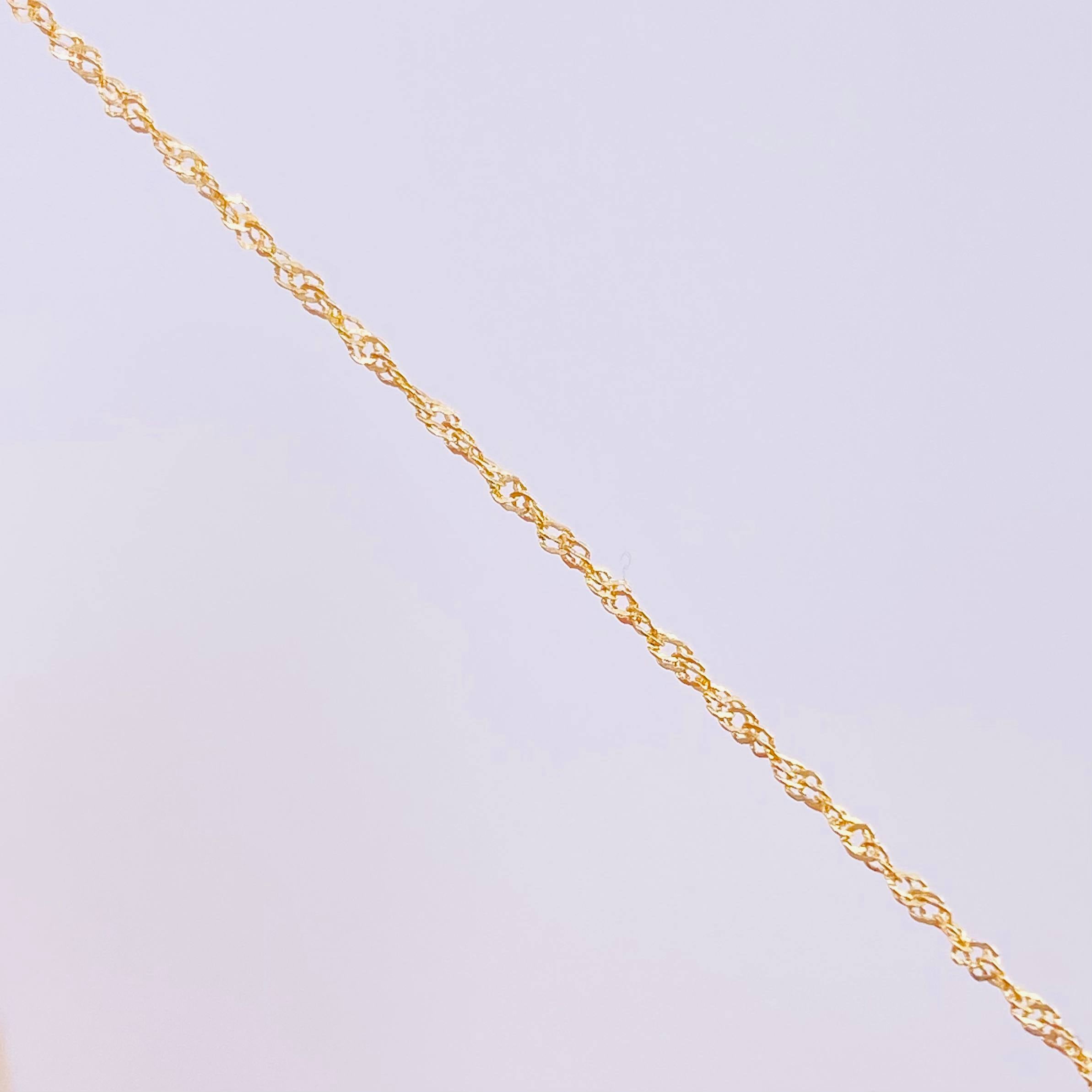 Set Cadena Singapur + Dije Silueta Corazón / 2g / 60cm Oro Amarillo 18K
