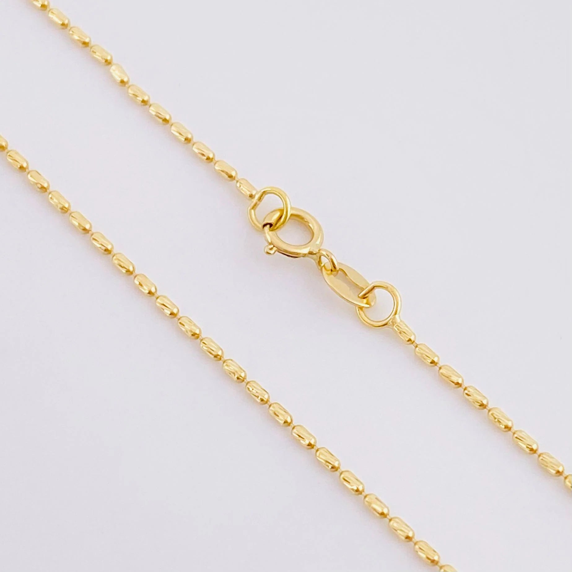 Cadena Morse 1.5g / 45cm / 0.75mm Oro Amarillo 18K