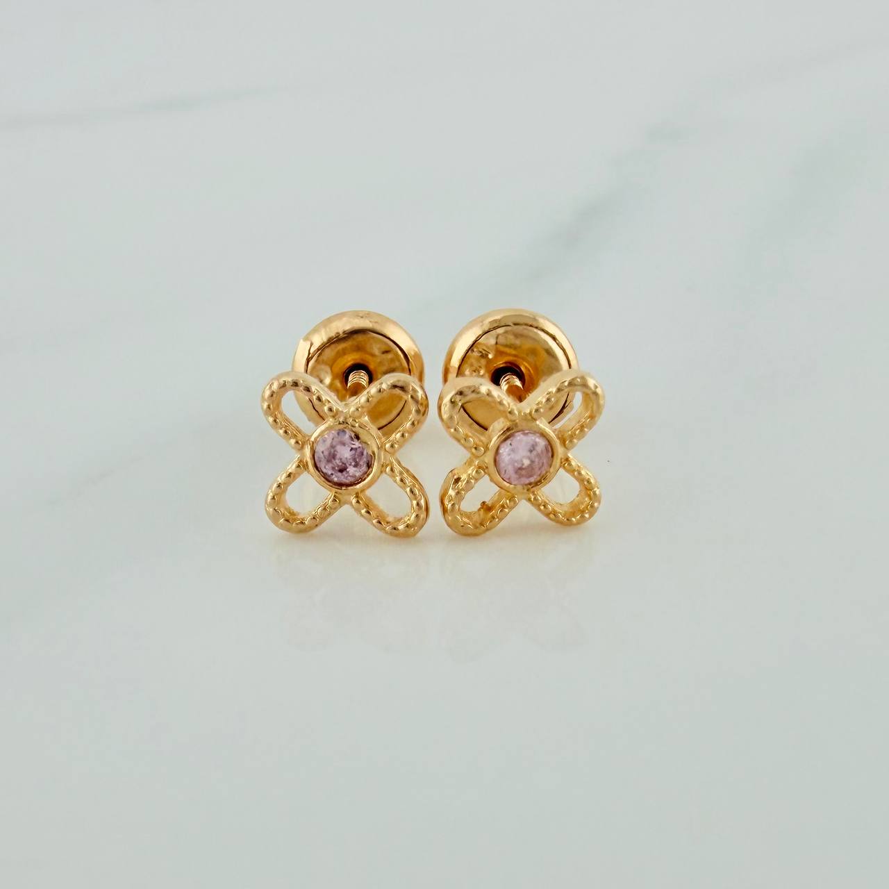 Topos Flor 0.85gr / 5.7mm Oro Amarillo 18K %