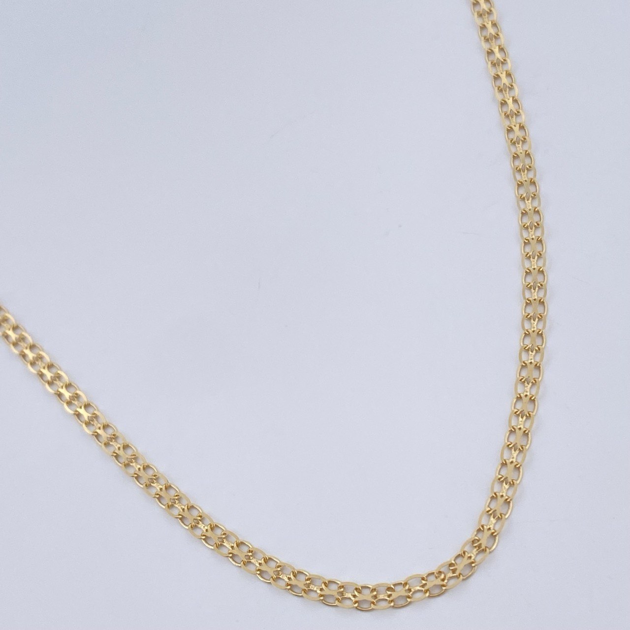 Cadena China 2.6gr / 60.3cm / Oro Amarillo +1 18K &