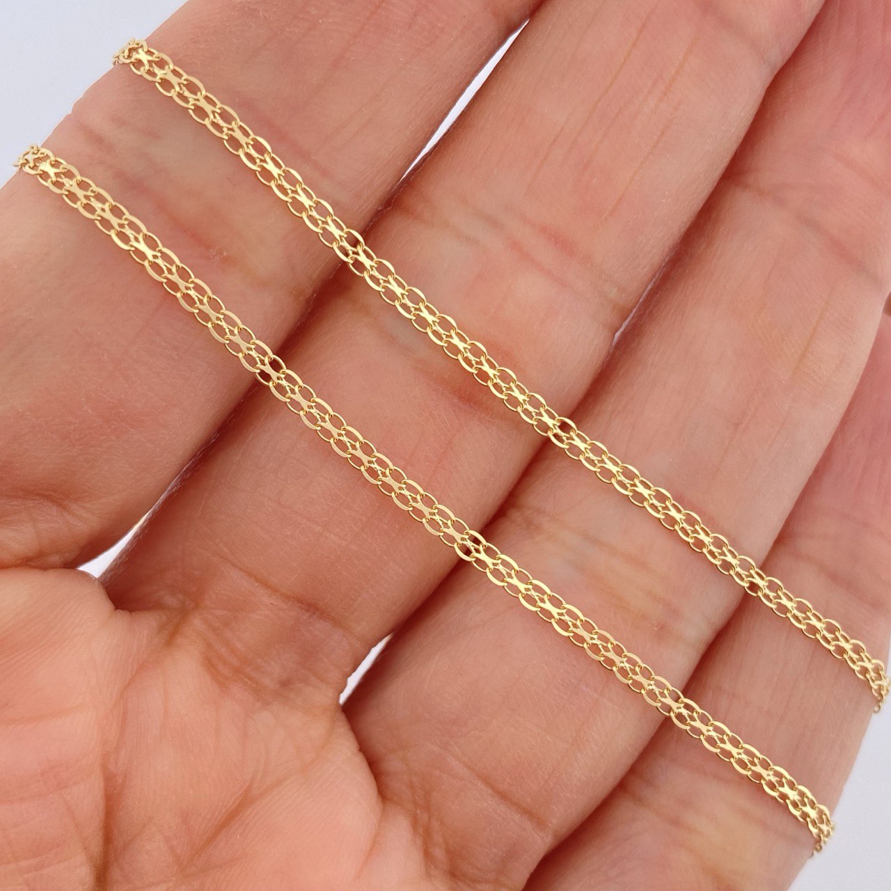 Cadena China 2.6gr / 60.3cm / Oro Amarillo +1 18K &