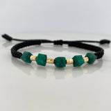 Pulsera Negra Morralla Cubica 5mm Cilindros 4 und Oro Amarillo 18K %