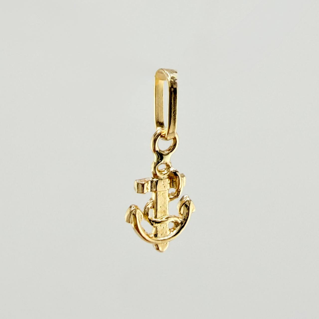 Dije Ancla 0.3gr / 1.4cm / Oro Amarillo 18K