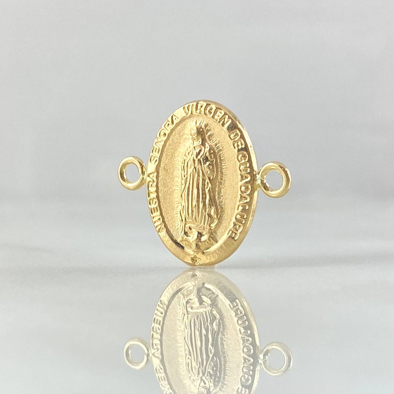 Herraje Virgen Guadalupe 0.75gr / 1.7cm / Ovalada-Troquelada Oro Amarillo 18K ©