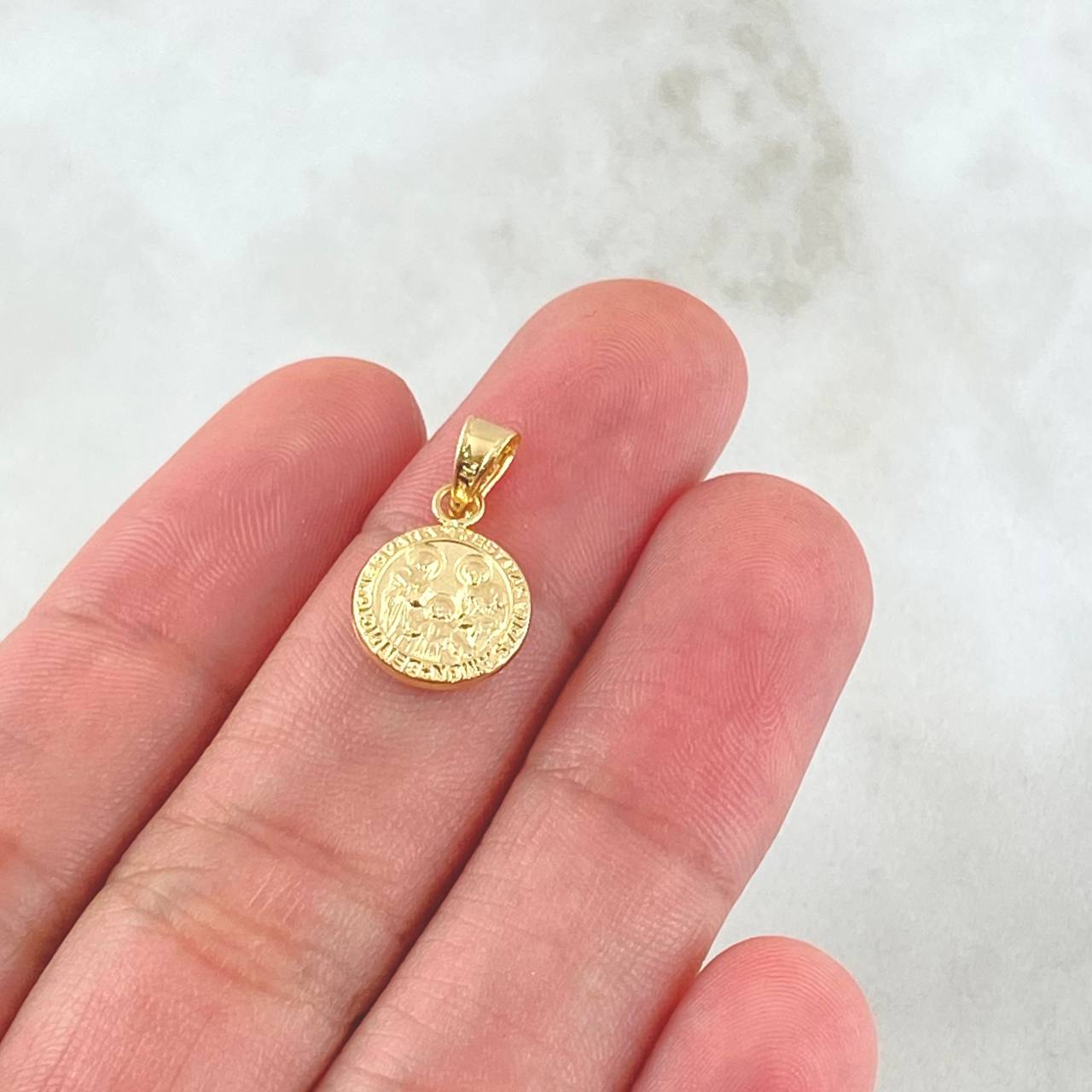 Dije Sagrada Familia 0.5gr / 1.7cm / Oro 18K