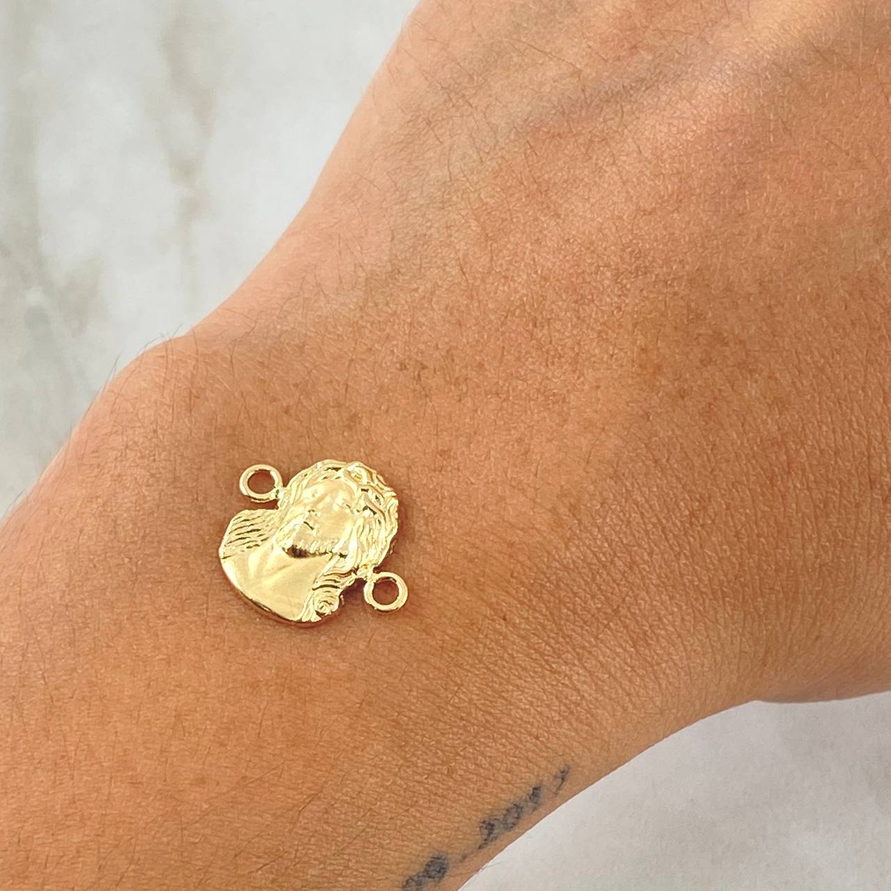 Herraje Rostro Jesus 0.9gr / 1.6cm / Oro 18K