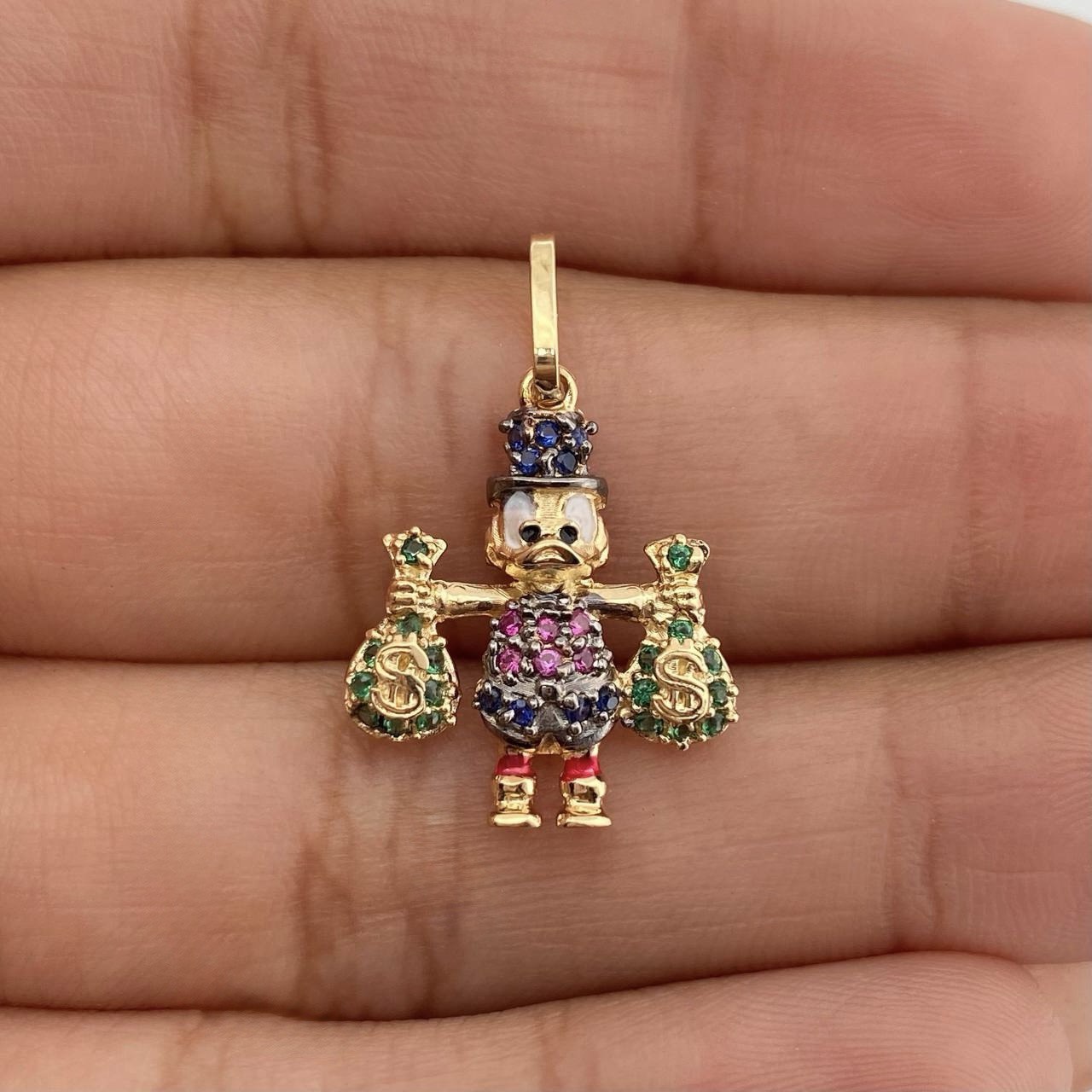 Dije Pato Bolsas de Dinero 1.7gr / 2.3cm / Dos Oros Negro Amarillo 18K %