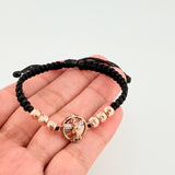 Pulsera Tejida Negra San Miguel Bolas Diamantadas Dos Oros Blanco Rosa 18K