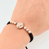 Pulsera Tejida Negra San Miguel Bolas Diamantadas Dos Oros Blanco Rosa 18K