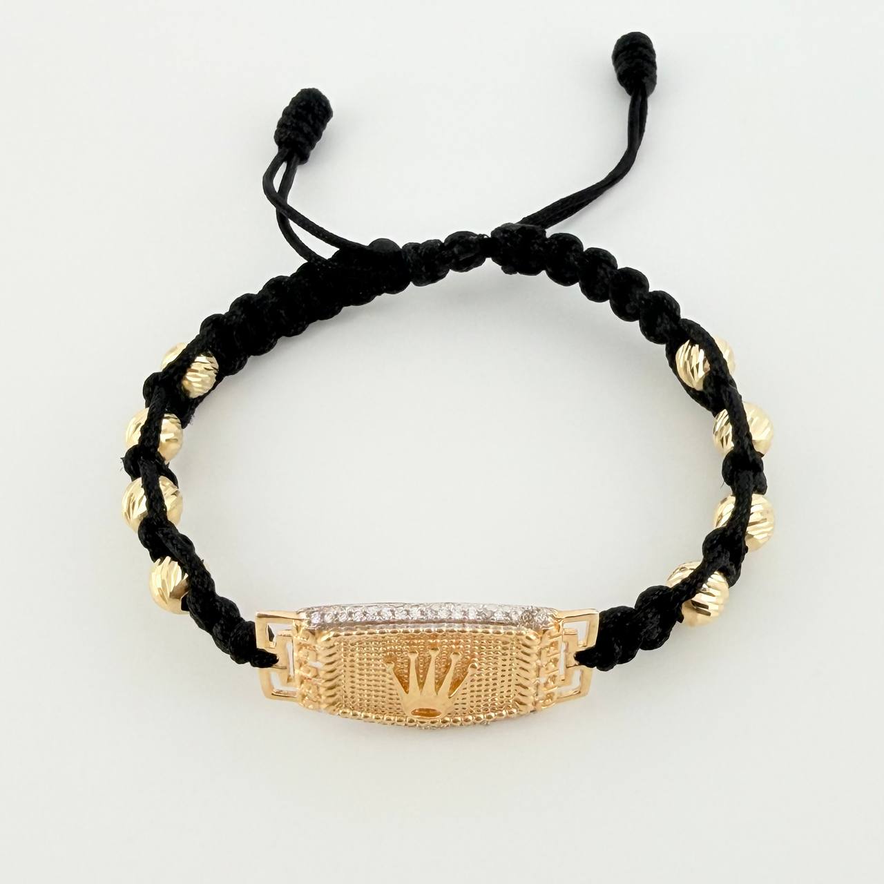 Pulsera Tejida Negra Placa Punteada Corona Bolas Diamantadas Dos Oros Amarillo Blanco 18K