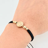 Pulsera Tejida Negra Tambor Corona Bolas Diamantadas Oro Amarillo 18K