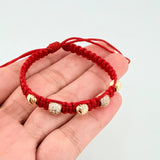 Pulsera Tejida Roja Bolas Diamantadas Oro Amarillo 18K