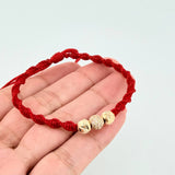 Pulsera Tejida Roja Bolas Diamantadas Oro Amarillo 18K