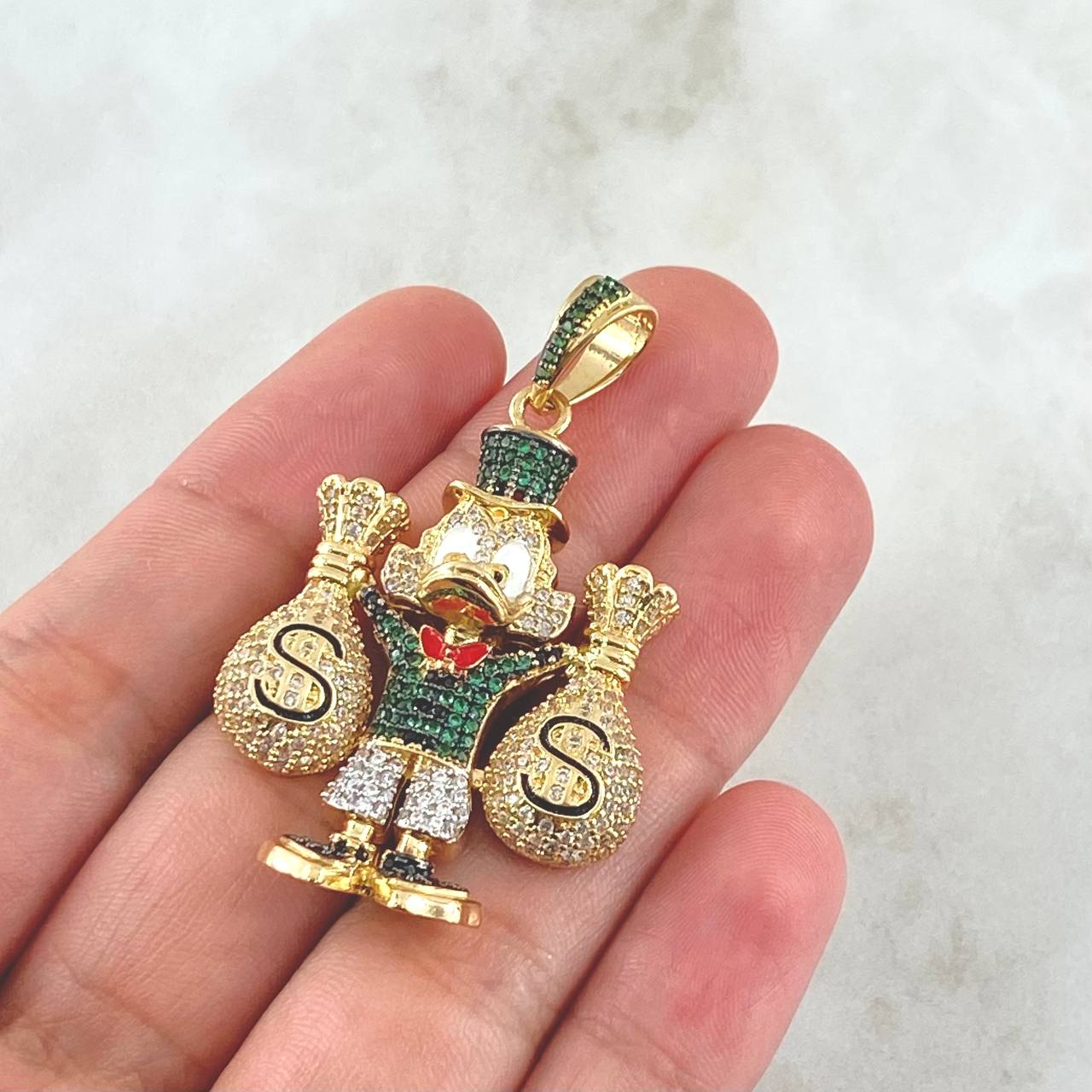 Dije Pato Bolsas de Dinero 16.25gr / 4.9cm / Circones Blancos Verdes Negros Oro Amarillo 18K *