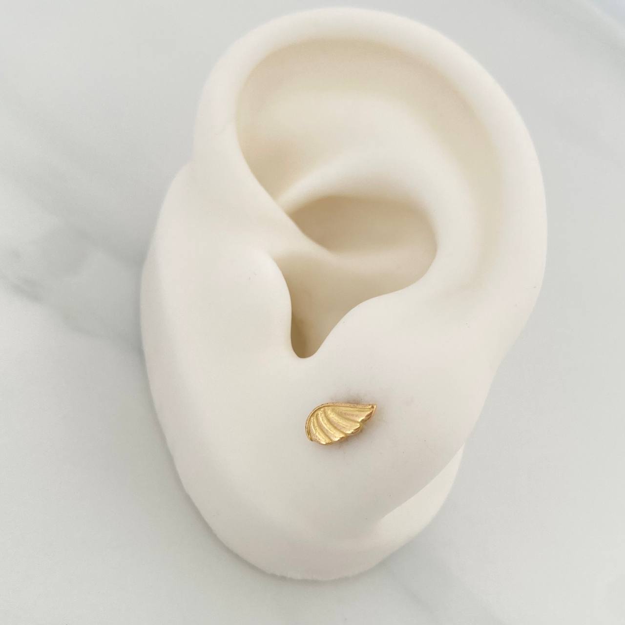 Topos Alas 0.75gr / 7.7mm Oro Amarillo 18K %