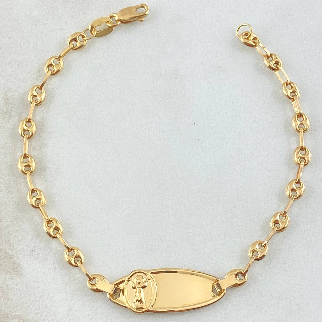 Pulso Bebé GC Placa Ovalada Divino Niño 2gr / 15.5cm / Oro Amarillo 18K ©