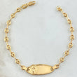 Pulso Bebé GC Placa Ovalada Divino Niño 2gr / 15.5cm / Oro Amarillo 18K ©