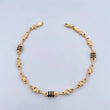 Pulso Rustico Barril Trebol 4.6gr / 22.3cm / 4.6mm Trebol Cauchos Negros Oro Amarillo 18K $
