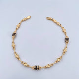 Pulso Rustico Barril Trebol 4.6gr / 22.3cm / 4.6mm Trebol Cauchos Negros Oro Amarillo 18K $