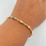 Pulso Rustico Barril Trebol 4.6gr / 22.3cm / 4.6mm Trebol Cauchos Negros Oro Amarillo 18K $