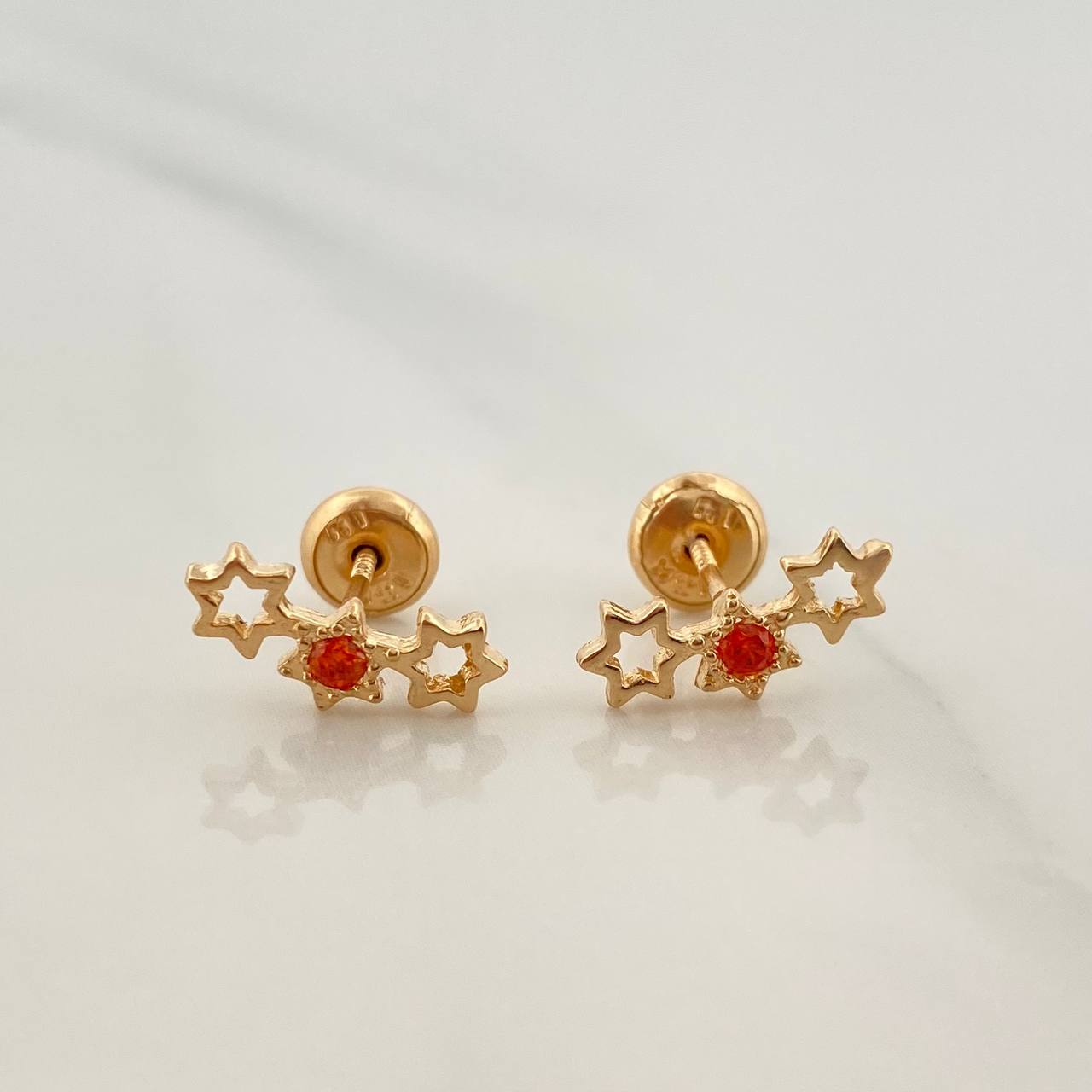Topos Silueta Estrellas 1.05gr / 11.6mm Oro Amarillo 18K %