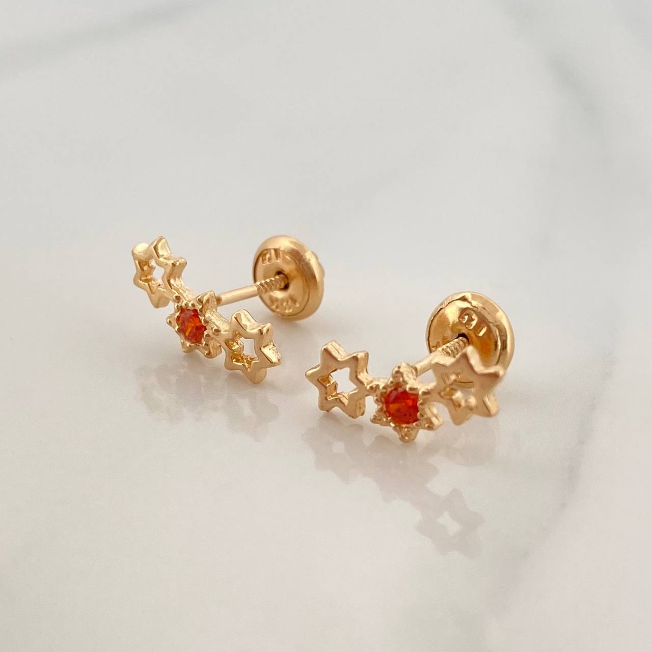 Topos Silueta Estrellas 1.05gr / 11.6mm Oro Amarillo 18K %