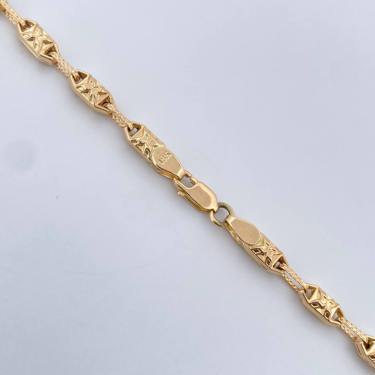 Cadena Rustica Equis Doble 13.25gr / 61.4cm / 4mm Punteada Oro Amarillo 18K $