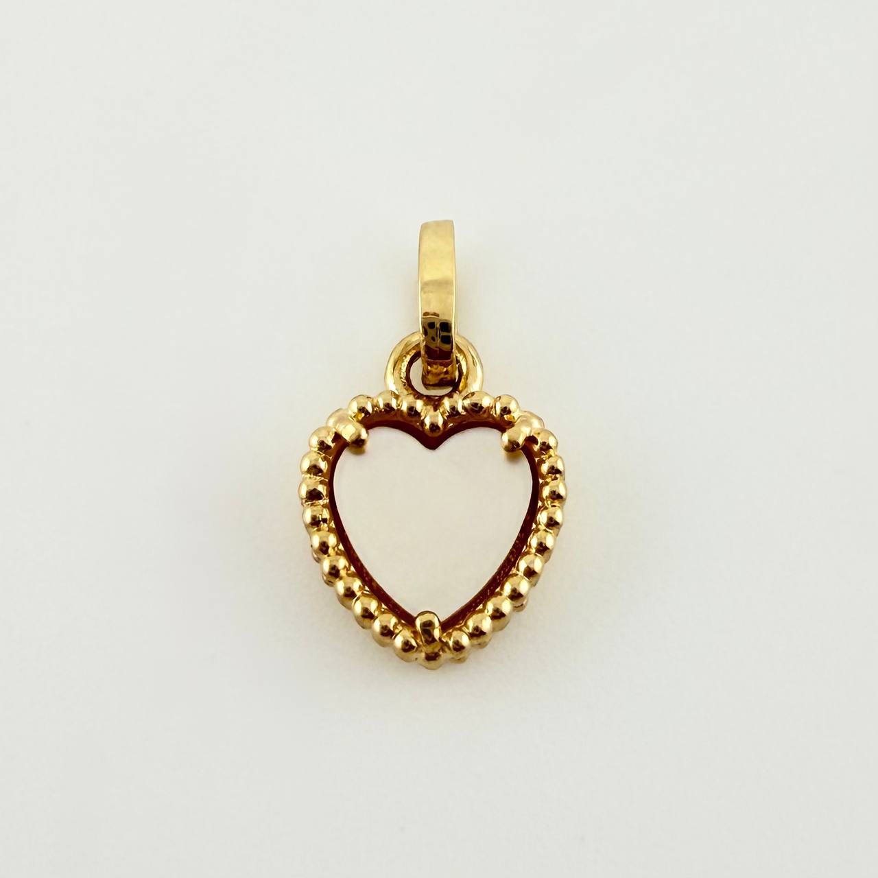Dije Corazon Blanco 1.05gr / 1.4cm / Oro Amarillo Nac.Esp. 18K