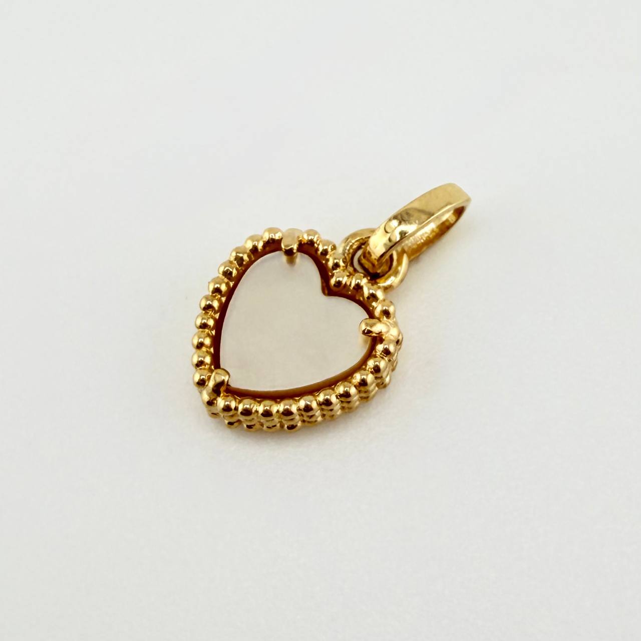 Dije Corazon Blanco 1.05gr / 1.4cm / Oro Amarillo Nac.Esp. 18K
