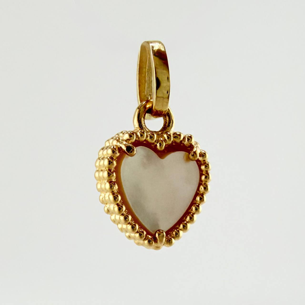 Dije Corazon Blanco 1.05gr / 1.4cm / Oro Amarillo Nac.Esp. 18K
