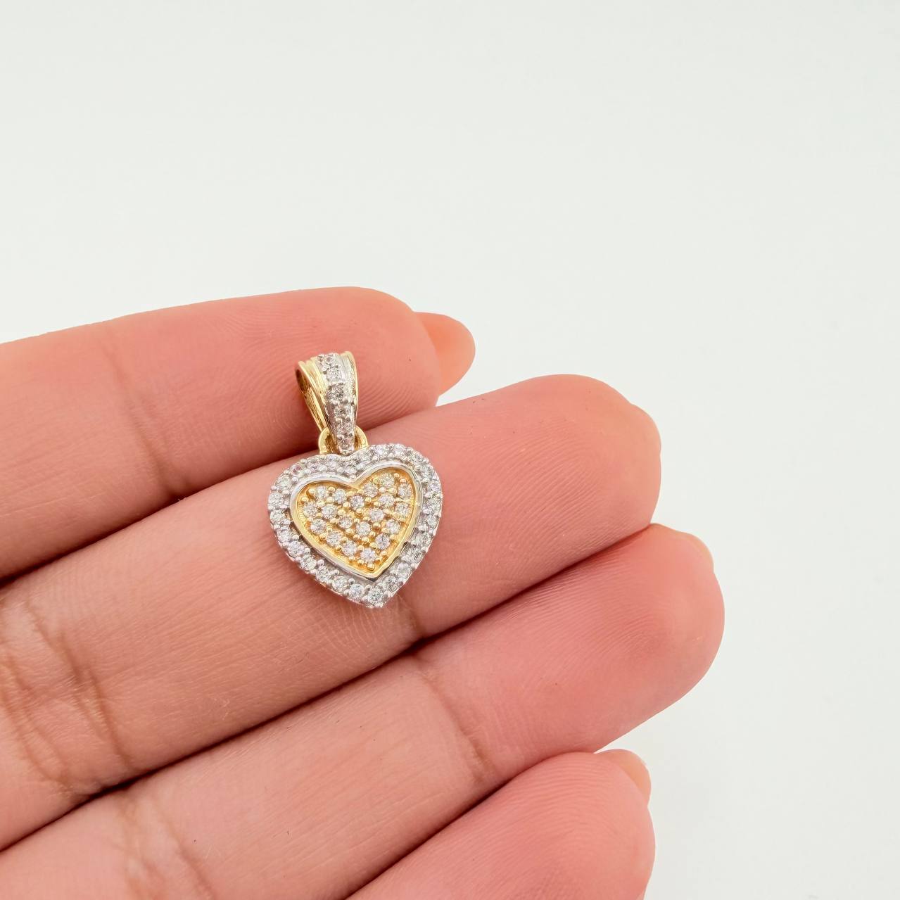 Dije Corazon Tupido 1.45gr / 1.8cm / Dos Oros Amarillo Blanco 18K