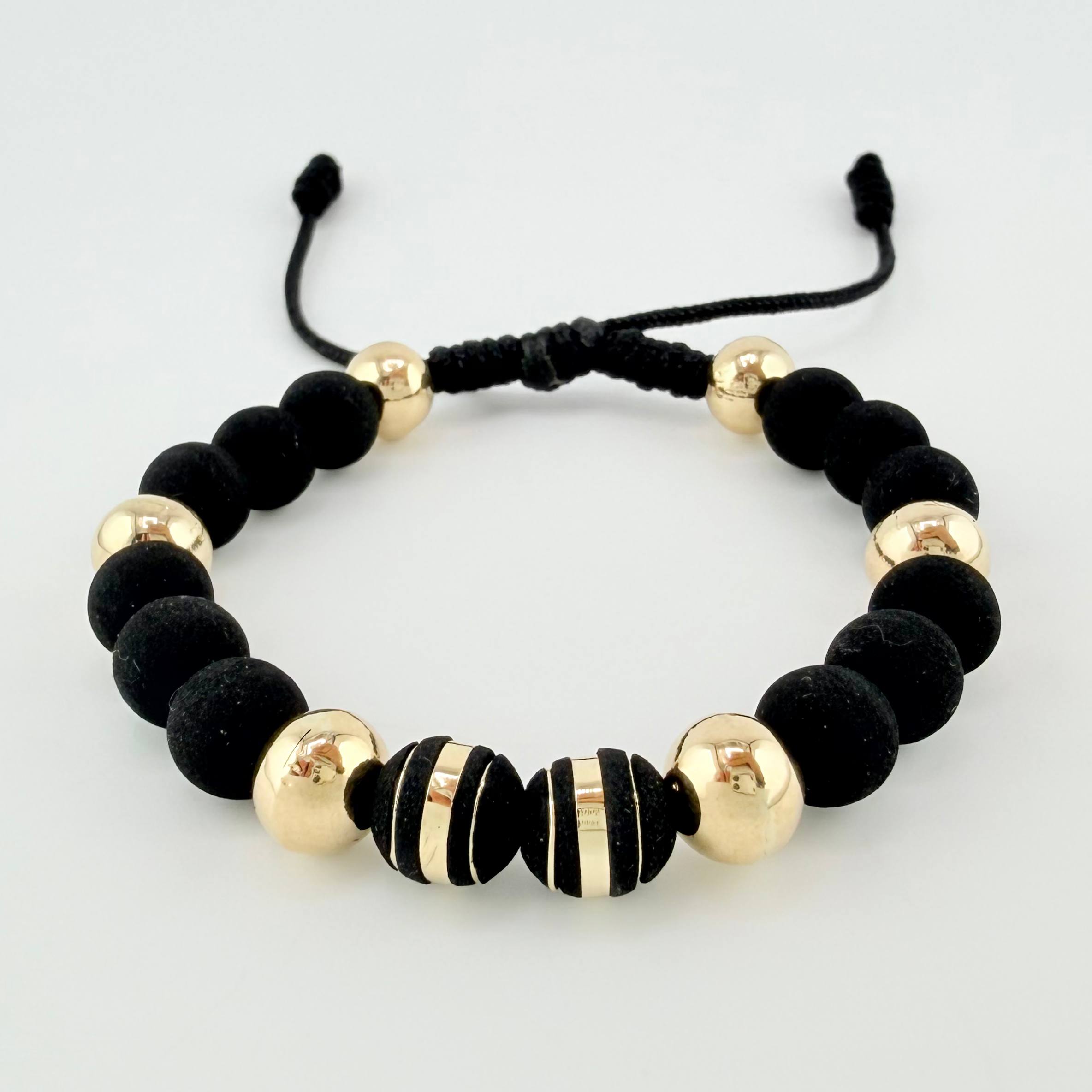 Pulsera Negra Neoros 2und Bolas 6und 1.85gr / 8mm Oro Amarillo 18K ©