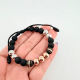 Pulsera Negra Neoros 2und Bolas 7und 2.2gr / 8mm Tres Oros 18K ©