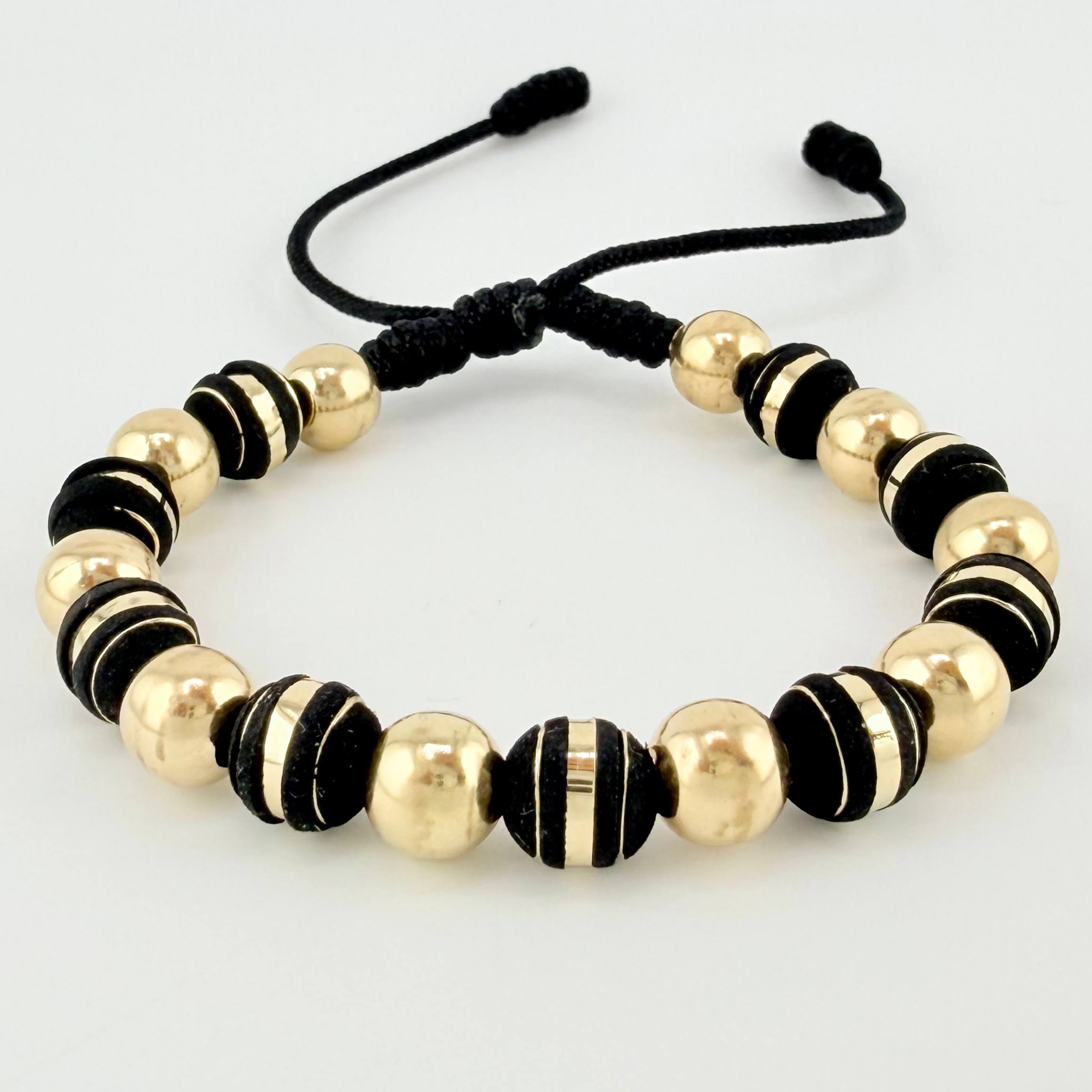 Pulsera Negra Neoros 9und Bolas 10und 2.5gr / 7mm Oro Amarillo 18K ©