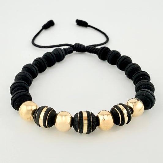 Pulsera Negra Neoros 3und Bolas 4und 1gr / 7mm Oro Amarillo 18K ©