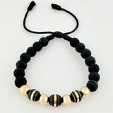 Pulsera Negra Neoros 3und Bolas 4und 1gr / 7mm Oro Amarillo 18K ©