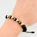 Pulsera Negra Neoros 3und Bolas 4und 1gr / 7mm Oro Amarillo 18K ©