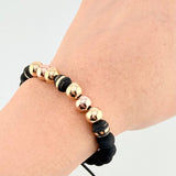 Pulsera Negra Neoros 3und Bolas 6und 1.85gr / 8mm Dos Oros Amarillo Rosa 18K ©