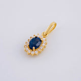 Dije Óvalo Tupido Zafiro 65pts 1.3g / 1.8cm Oro Amarillo 18K