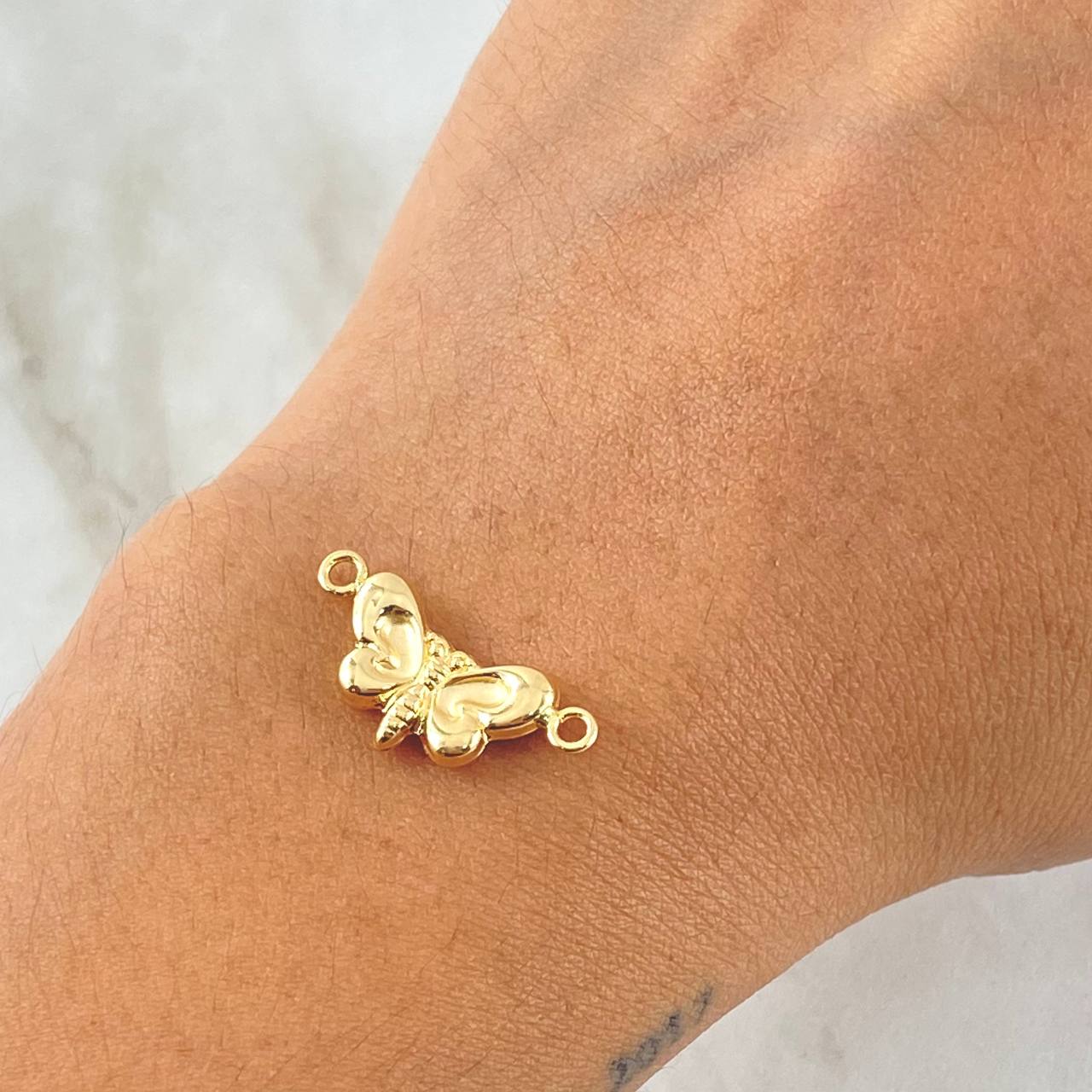 Herraje Mariposa 0.75gr / 2.2cm / Oro 18K