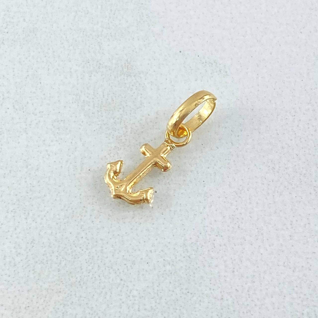 Dije Ancla 0.25gr / 1.4cm / Oro 18K