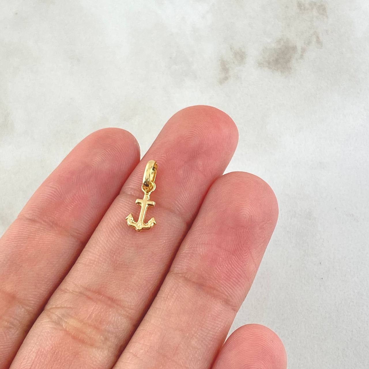 Dije Ancla 0.25gr / 1.4cm / Oro 18K