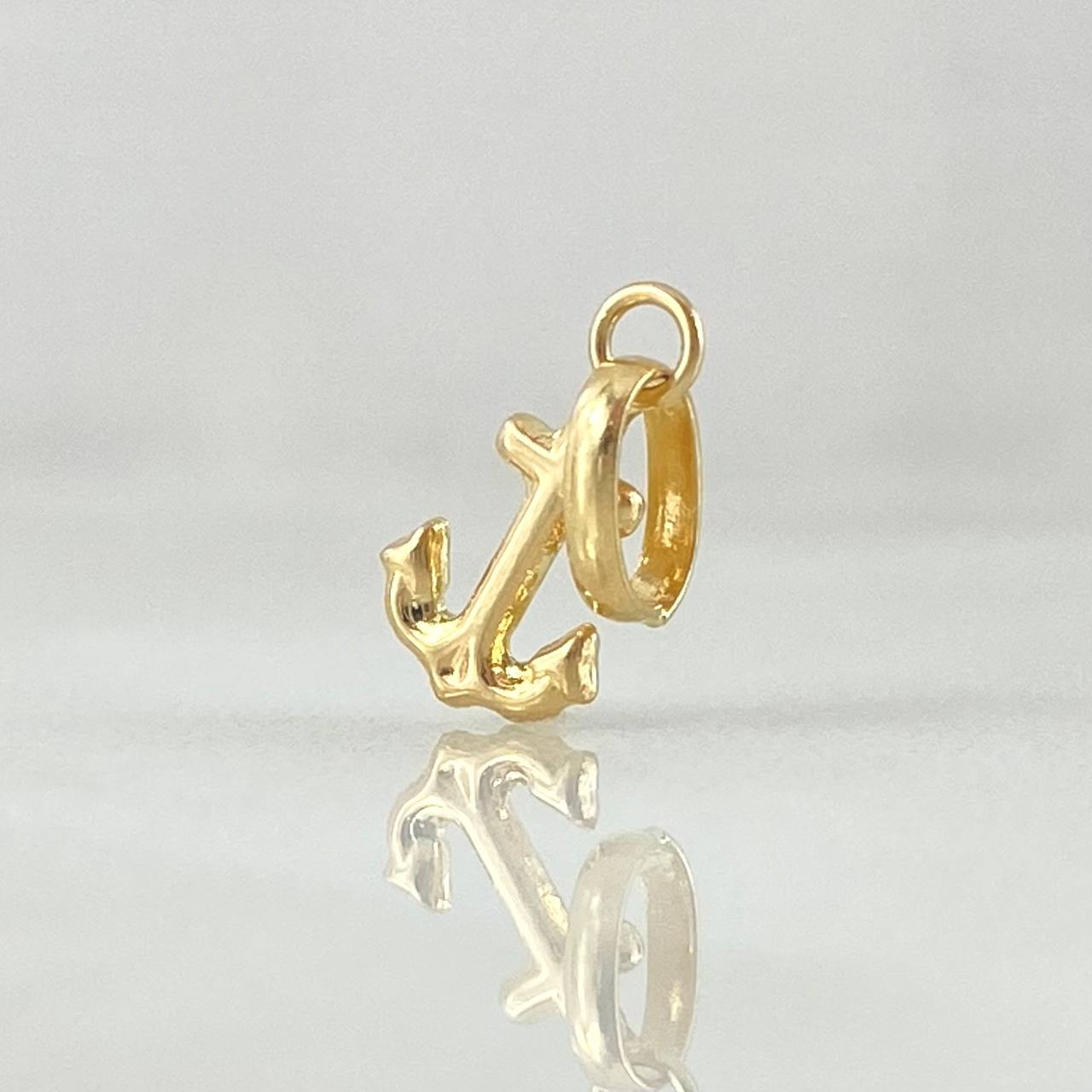Dije Ancla 0.25gr / 1.4cm / Oro 18K