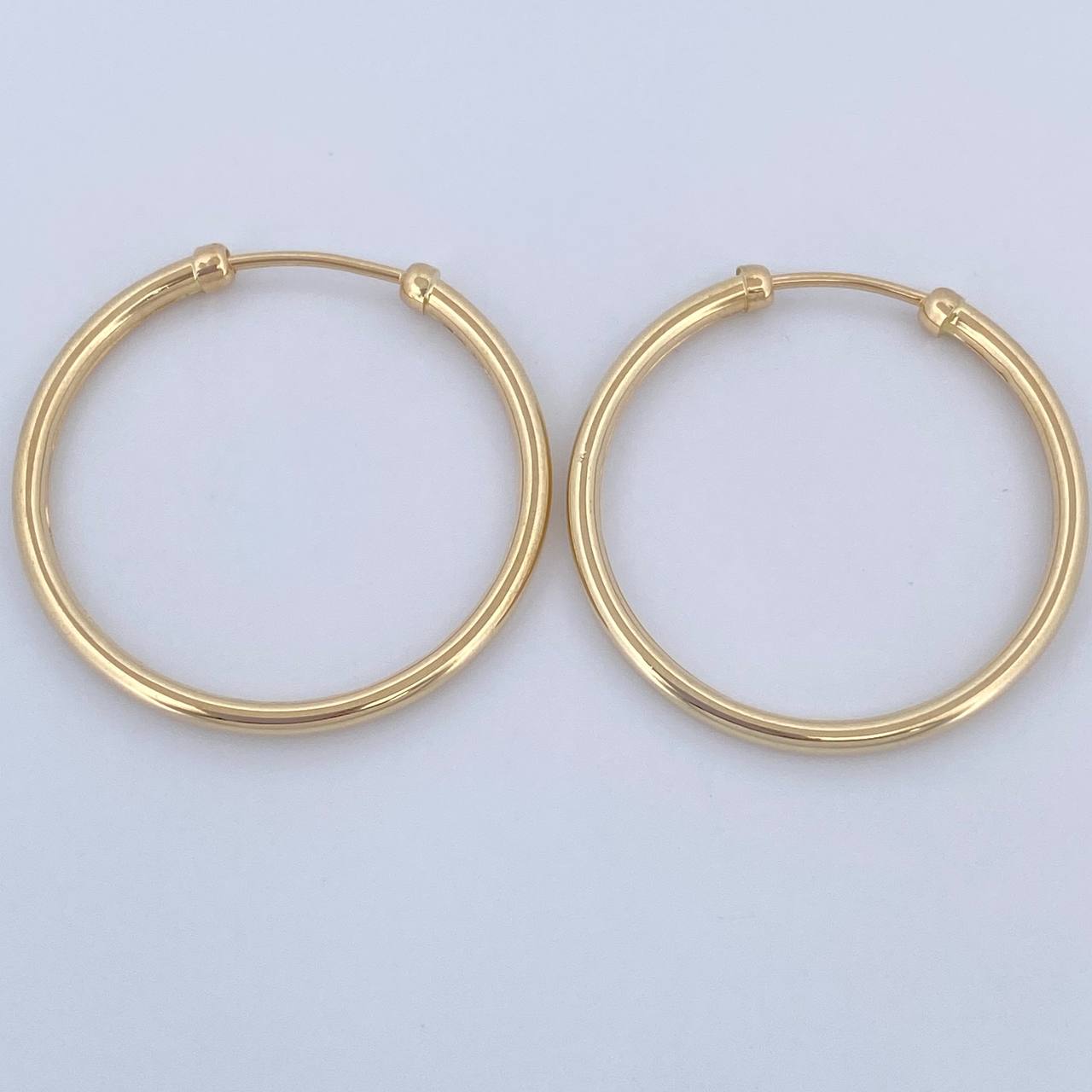 Candongas Caponeras 2.35gr / 2.6cm / Oro 18K $