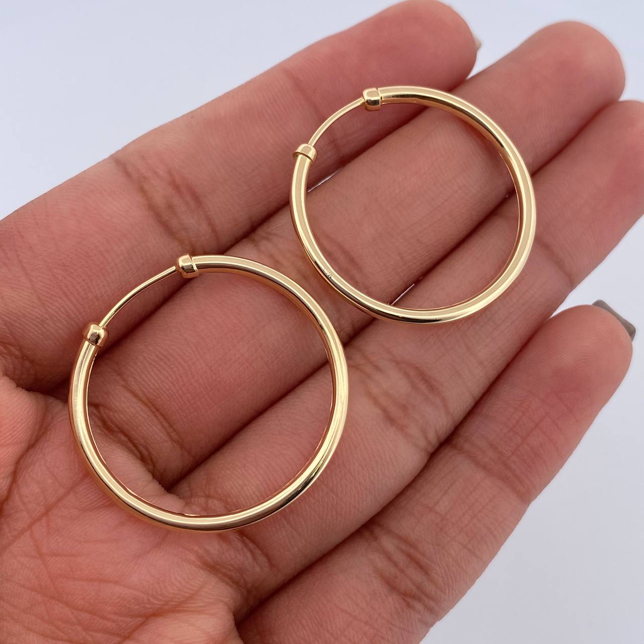 Candongas Caponeras 2.35gr / 2.6cm / Oro 18K $