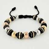 Pulsera Negra Neoros 10und Bolas 10und 3.1gr / 8mm Tres Oros 18K ©